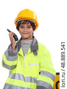schoolboy dressed as foreman. Стоковое фото, агентство Ingram Publishing / Фотобанк Лори