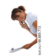 Woman with telephone and address book. Стоковое фото, агентство Ingram Publishing / Фотобанк Лори