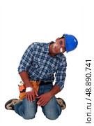 Builder drowsy following accident. Стоковое фото, агентство Ingram Publishing / Фотобанк Лори
