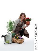 female florist with flowers. Стоковое фото, агентство Ingram Publishing / Фотобанк Лори