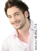 Young man with gelled hair. Стоковое фото, агентство Ingram Publishing / Фотобанк Лори