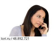 Concerned woman on mobile telephone. Стоковое фото, агентство Ingram Publishing / Фотобанк Лори