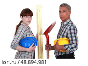 A team of tradespeople. Стоковое фото, агентство Ingram Publishing / Фотобанк Лори