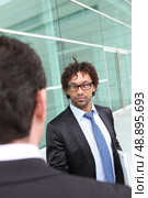 Businessmen having a disagreement. Стоковое фото, агентство Ingram Publishing / Фотобанк Лори