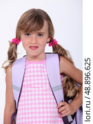 a little schoolgirl. Стоковое фото, агентство Ingram Publishing / Фотобанк Лори