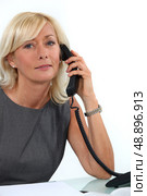 Businesswoman talking on the phone. Стоковое фото, агентство Ingram Publishing / Фотобанк Лори