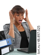 A horrified businesswoman. Стоковое фото, агентство Ingram Publishing / Фотобанк Лори