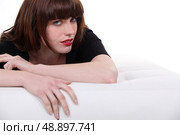 Woman hugging a footrest. Стоковое фото, агентство Ingram Publishing / Фотобанк Лори