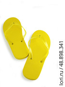 Yellow flip-flops. Стоковое фото, агентство Ingram Publishing / Фотобанк Лори