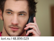 Young man on the phone. Стоковое фото, агентство Ingram Publishing / Фотобанк Лори