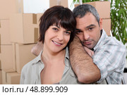 man and woman moving into a new apartment. Стоковое фото, агентство Ingram Publishing / Фотобанк Лори