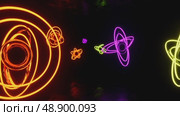 Neon glowing shapes of atoms floating in a dark environment. Стоковое AI-видео, аниматор KATERINA AI / Фотобанк Лори