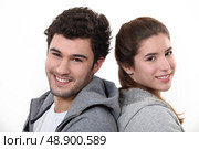 Portrait of a young man and woman. Стоковое фото, агентство Ingram Publishing / Фотобанк Лори