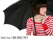 Woman stood with umbrella. Стоковое фото, агентство Ingram Publishing / Фотобанк Лори