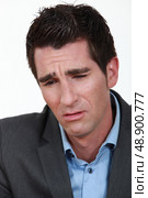 Businessman crying. Стоковое фото, агентство Ingram Publishing / Фотобанк Лори