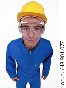 Craftsman in overalls. Стоковое фото, агентство Ingram Publishing / Фотобанк Лори