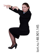 Woman pretending to be puppeteer. Стоковое фото, агентство Ingram Publishing / Фотобанк Лори