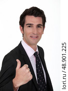 Smiling businessman giving the thumb’s up. Стоковое фото, агентство Ingram Publishing / Фотобанк Лори