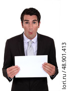 Businessman with a blank board. Стоковое фото, агентство Ingram Publishing / Фотобанк Лори