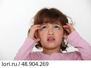 little girl looking afraid. Стоковое фото, агентство Ingram Publishing / Фотобанк Лори
