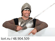 Man in knights costume. Стоковое фото, агентство Ingram Publishing / Фотобанк Лори