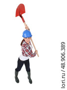Woman holding spade over head. Стоковое фото, агентство Ingram Publishing / Фотобанк Лори