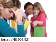 Female student being bullied. Стоковое фото, агентство Ingram Publishing / Фотобанк Лори