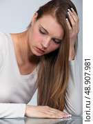 Blond woman with a headache. Стоковое фото, агентство Ingram Publishing / Фотобанк Лори