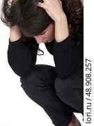 Sad woman squatting. Стоковое фото, агентство Ingram Publishing / Фотобанк Лори