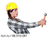 Woman in yellow helmet. Стоковое фото, агентство Ingram Publishing / Фотобанк Лори