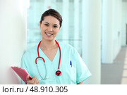 A medical professional with a clipboard. Стоковое фото, агентство Ingram Publishing / Фотобанк Лори