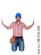 Trapped builder. Стоковое фото, агентство Ingram Publishing / Фотобанк Лори