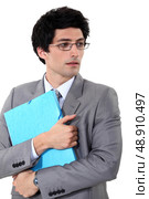 Businessman holding a folder. Стоковое фото, агентство Ingram Publishing / Фотобанк Лори