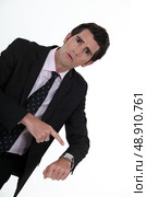 Boss pointing to his watch. Стоковое фото, агентство Ingram Publishing / Фотобанк Лори