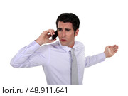 Man talking with his wife. Стоковое фото, агентство Ingram Publishing / Фотобанк Лори