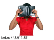 Woman hiding her face behind a leather-bound book. Стоковое фото, агентство Ingram Publishing / Фотобанк Лори