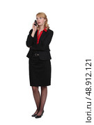 Exasperated woman talking on her mobile phone. Стоковое фото, агентство Ingram Publishing / Фотобанк Лори