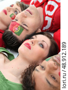 Patriotic Portuguese friends. Стоковое фото, агентство Ingram Publishing / Фотобанк Лори