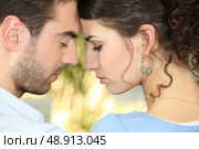 couple heads joined in profile. Стоковое фото, агентство Ingram Publishing / Фотобанк Лори