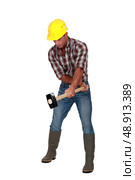 Worker with a sledgehammer. Стоковое фото, агентство Ingram Publishing / Фотобанк Лори