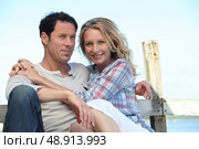 Couple on a pontoon. Стоковое фото, агентство Ingram Publishing / Фотобанк Лори