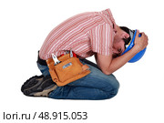 Tradesman grieving. Стоковое фото, агентство Ingram Publishing / Фотобанк Лори