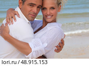 Couple on the beach. Стоковое фото, агентство Ingram Publishing / Фотобанк Лори