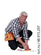 Technician who got an electrical shock. Стоковое фото, агентство Ingram Publishing / Фотобанк Лори