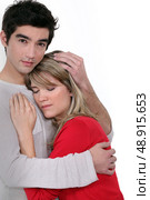A man comforting his girlfriend. Стоковое фото, агентство Ingram Publishing / Фотобанк Лори