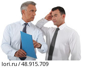Boss reprimanding his employee. Стоковое фото, агентство Ingram Publishing / Фотобанк Лори