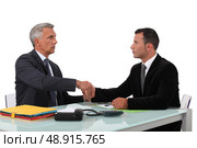 A business handshake. Стоковое фото, агентство Ingram Publishing / Фотобанк Лори