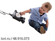 Child playing with a telephone. Стоковое фото, агентство Ingram Publishing / Фотобанк Лори