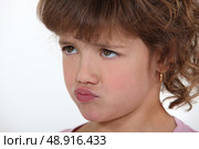 Little girl pouting. Стоковое фото, агентство Ingram Publishing / Фотобанк Лори