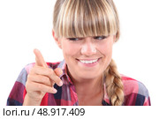 Young woman wagging her finger in a lighthearted manner. Стоковое фото, агентство Ingram Publishing / Фотобанк Лори